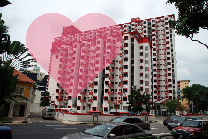 A smart-looking public housing building with a heart superimposed over it